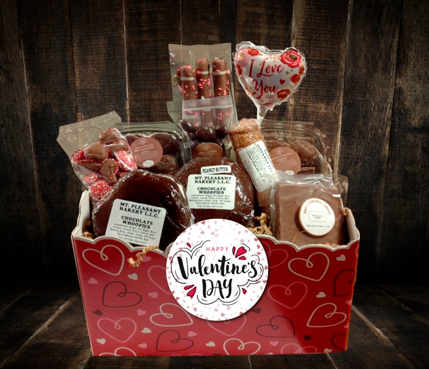 Our Valentine's Day Gift for Him or Her is a basket loaded with our unique chocolate sweets, whoopie pies, cinnamon stick filled with cream cheese, and so much more. 